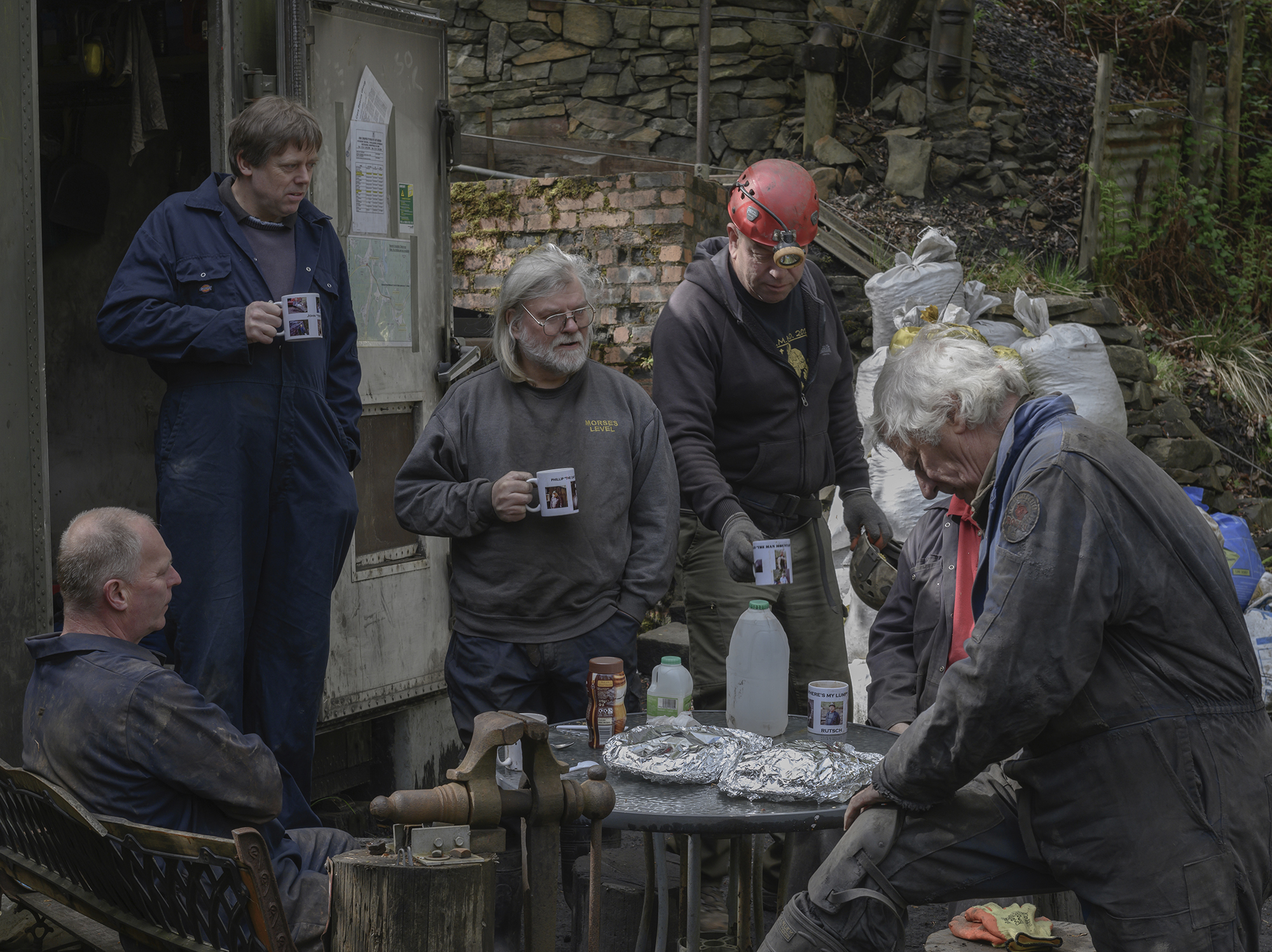 Miners drinking tea before going underground